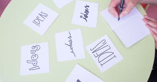 man writing ideas