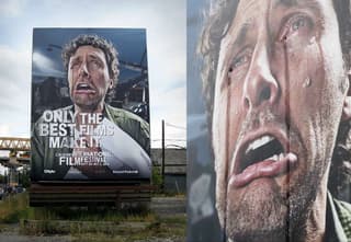 man crying billboard advertising