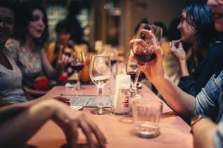 people drinking and socializing